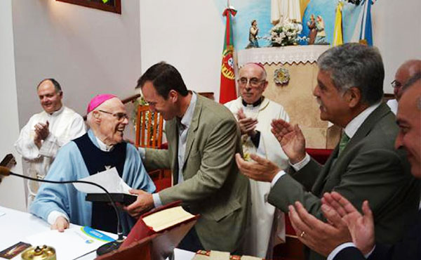 El arzobispo Di Monte con López y De Vido